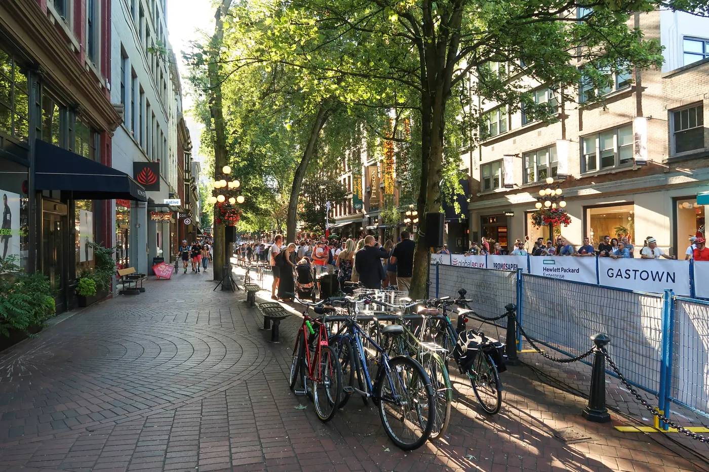 Shops and pedestrians along brick-paved Water Street in Gastown